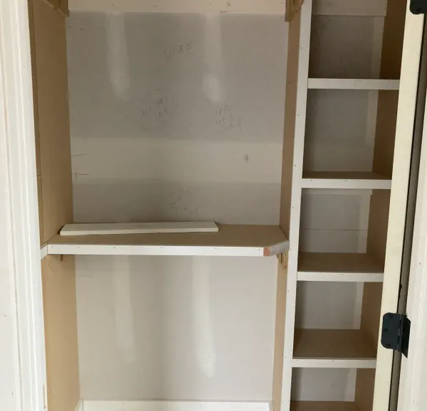 Custom cabinet and shelving build by Peak Home Improvement