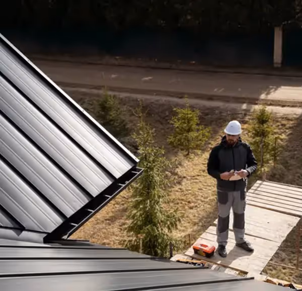 Assessing gutters during a free consultation, Midsouth USA