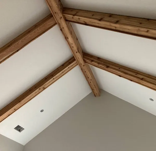 Exposed beam craftsmanship by Peak Home Improvement