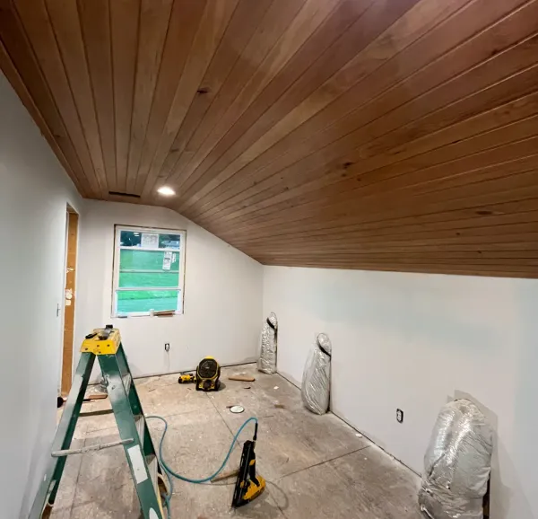 Wood ceiling renovation in progress by Peak Home Improvement